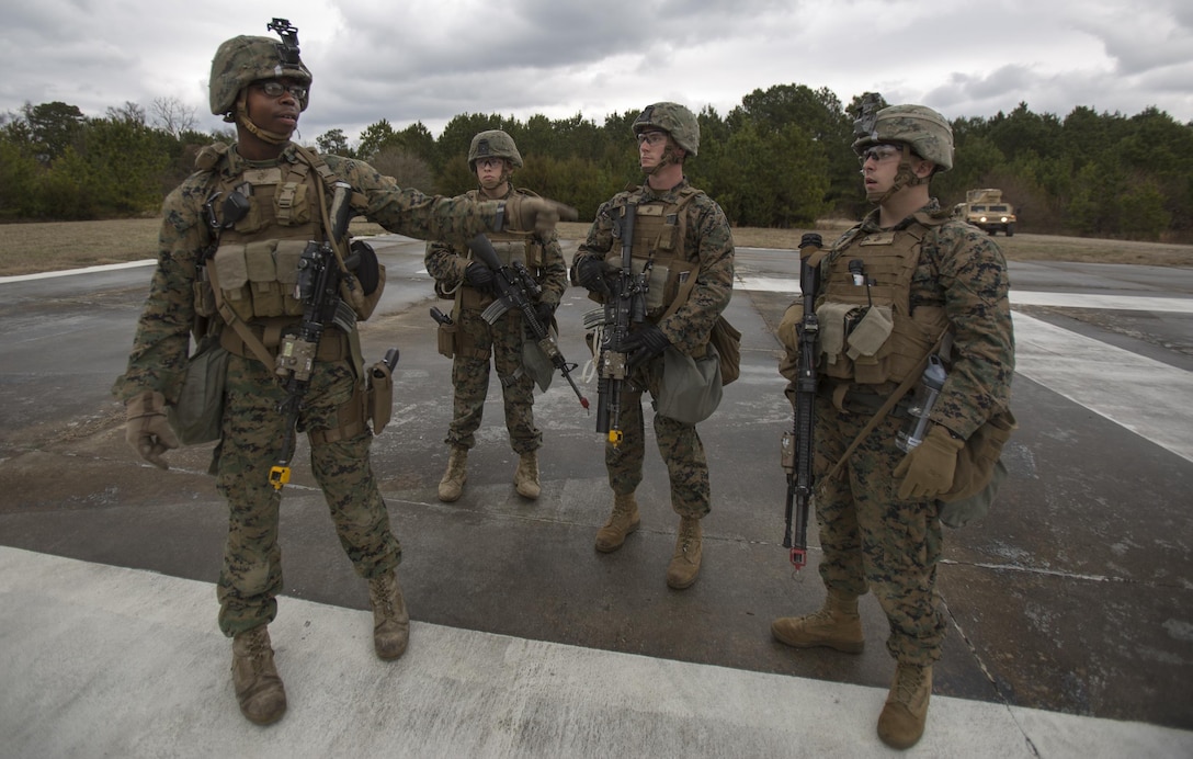 Pfc. Robert Haughn, Company A, Fleet Anti-Terrorism Security Team, Marine Corps Security Force Regiment, prepares to use simulated, non-lethal ammunition on role-players causing a disturbance around a secured compound during a company-level operational readiness exercise aboard Naval Weapons Station Yorktown, Va., Jan. 17, 2017, in preparation for the platoon’s deployment to Spain. The Marines from 1st platoon, Company A, were evaluated on their abilities to accomplish their mission during this four-day exercise, which was to reinforce embassies around the world and to ensure the compounds they occupy are secured.(Official U.S. Marine Corps photo by Sgt. Calvin Shamoon/ Released)