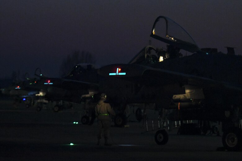 An Airman assigned to the 25th Aircraft Maintenance Unit pre-flights an A-10 Thunderbolt II at Osan Air Base, Republic of Korea, Jan. 25, 2017. The A-10 was prepped for a night flight as part of Exercise Pacific Thunder 17-1, a combat search and rescue exercise. (U.S. Air Force photo by Senior Airman Victor J. Caputo)