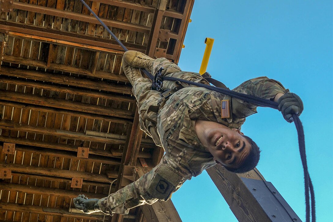 A soldier conducts rappel operations at Fort Bliss, Texas, Jan. 17, 2017. The soldier is assigned to Headquarters and Headquarters Company, 1st Battalion, 153rd Infantry Regiment. Army photo by Spc. Victoria Eckert