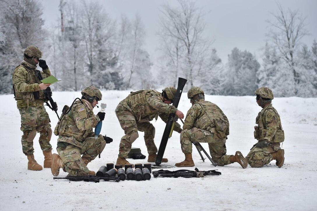 Soldiers conduct a mortar live-fire exercise at the 7th Army Training Command’s Grafenwoehr Training Area in Germany, Jan. 24, 2017. Army photo by Gertrud Zach

