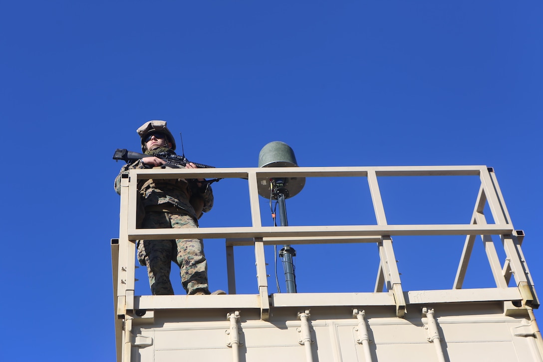 Cpl. Jerrod Peterson provides security for his team at Camp Lejeune, N.C., Jan. 25, 2017. The unit is participating in embassy reinforcement exercises, which consist of relaying information to the embassy and enhancing skills within the unit in order to prepare for a Special Purpose Marine Air-Ground Task Force. Peterson is a support team leader with Alpha Co., 2nd Radio Battalion.