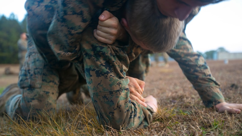 Marines with 2nd Battalion, 8th Marine Regiment, 2nd Marine Division engage in Marine Corps Martial Art Program ground fighting during an event known as advanced course preparation training at Marine Corps Base Camp Lejeune, N.C., Jan. 23, 2017. The event was a seven-mile course that served as an initial performance assessment and tested the Marines on basic knowledge and skills. It is a way for the Marines to know which skills to refine before they begin a military occupational specialty specific advanced course. 