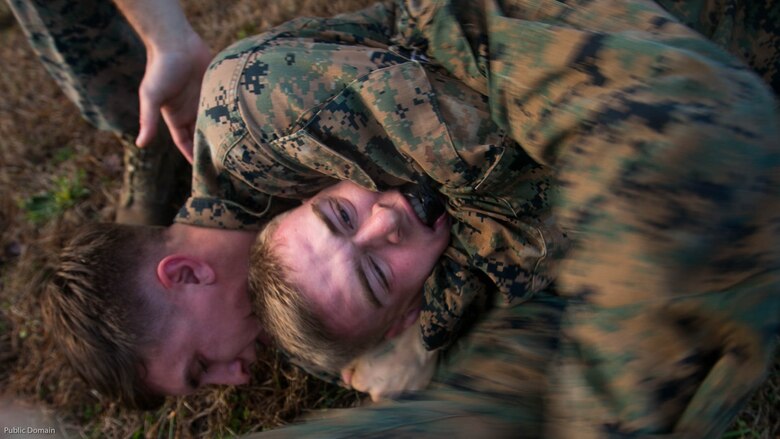 Marines with 2nd Battalion, 8th Marine Regiment, 2nd Marine Division engage in Marine Corps Martial Art Program ground fighting during an event known as advanced course preparation training at Marine Corps Base Camp Lejeune, N.C., Jan. 23, 2017. The event was a seven-mile course that served as an initial performance assessment and tested the Marines on basic knowledge and skills. It is a way for the Marines to know which skills to refine before they begin a military occupational specialty specific advanced course.