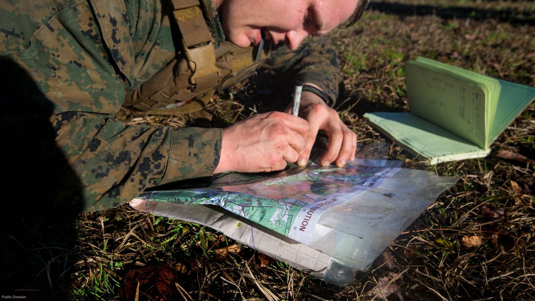 Cpl. Thomas Cornell plots points on a map during an event known as advanced course preparation training at Marine Corps Base Camp Lejeune, N.C., Jan. 23, 2017. The event was a seven-mile course that served as an initial performance assessment and tested the Marines on basic knowledge and skills. It is a way for the Marines to know which skills to refine before they begin a military occupational specialty specific advanced course. Cornell is with 2nd Battalion, 8th Marine Regiment, 2nd Marine Division. 