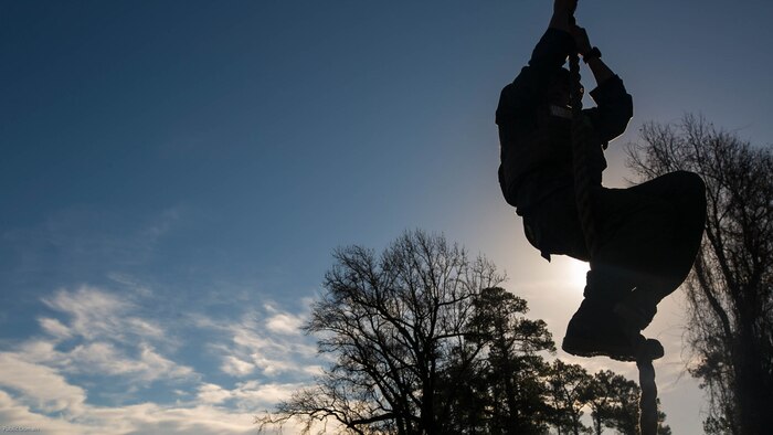 A Marine with 2nd Battalion, 8th Marine Regiment, 2nd Marine Division climbs a rope on the obstacle course during an event known as advanced course preparation training at Marine Corps Base Camp Lejeune, N.C., Jan. 23, 2017. The event was a seven-mile course that served as an initial performance assessment and tested the Marines on basic knowledge and skills. It is a way for the Marines to know which skills to refine before they begin a military occupational specialty specific advanced course. 