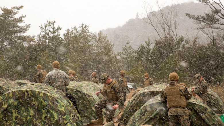 U.S. Marines with Marine Wing Support Squadron (MWSS) 171 set up two-man tents during exercise Kamoshika Wrath 17-1 at the Japan Ground Self-Defense Force’s Haramura Maneuver Area in Hiroshima, Japan, Jan. 22, 2017. The exercise is a biannual unit level training exercise that is primarily focused on establishing a forward operating base and providing airfield operation services. MWSS-171 trains throughout the year, completing exercises like Kamoshika Wrath 17-1 to enhance their technical skills, field experience and military occupational specialty capability. 
