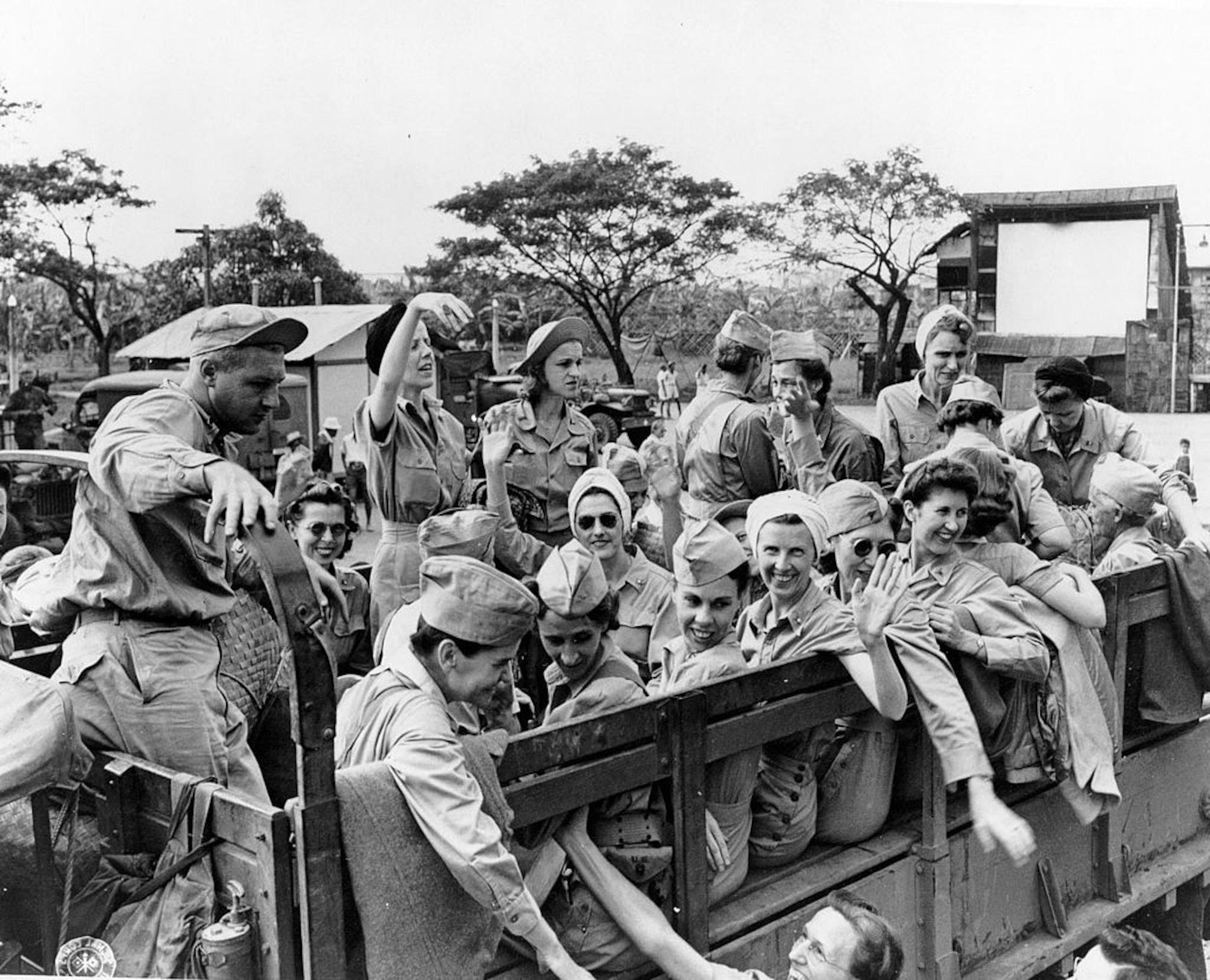Lt. Col. Helen Hennessey was captured as a prisoner of war in 1942 and sent to the Santo Tomas internment camp in Manila. She was one of the many nurses captured on the island of Corregidor. This is an image of many of those nurses being rescued when Santo Tomas was eventually liberated by American troops in 1945. [12 February 1945]
