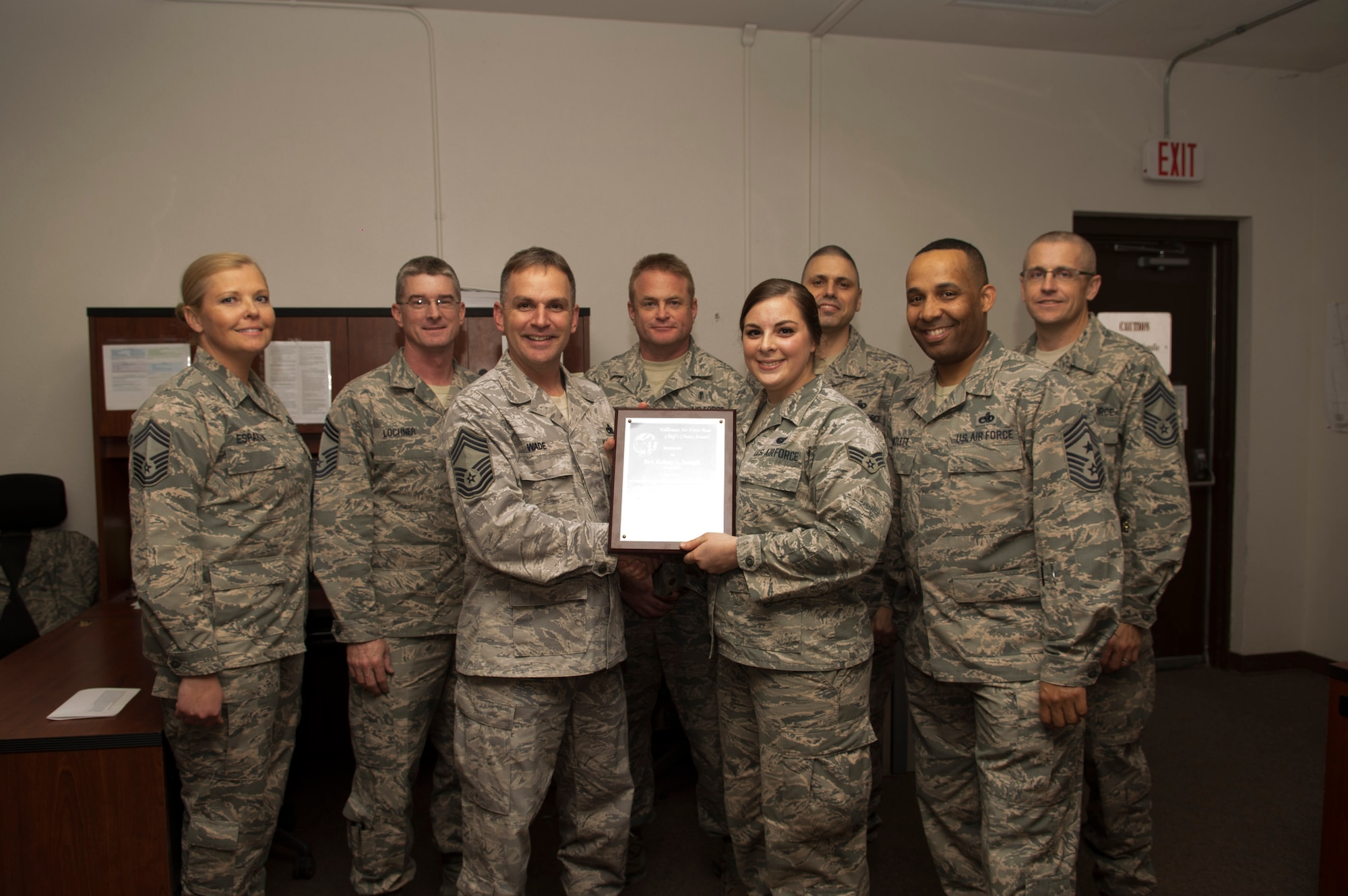 Senior Airman Kelsey Joseph, a 49th Aircraft Maintenance Squadron communication system journeyman, receives a Chief’s Choice Award, from Chief Master Sgt. David Wade, the 49th AMXS Superintendent Jan. 19, 2017 at Holloman Air Force Base, N.M. (U.S. Air Force photo by Tech. Sgt. Amanda Junk)