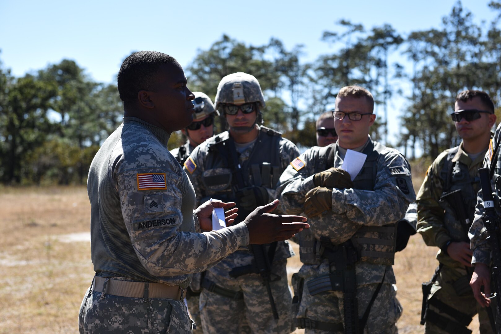 Sgt. Charles Anderson, 1st Battalion, 228 Aviation Regiment, provides feedback to Joint Security Forces soldiers after reviewing their Mechanism, Injury, Signs and Symptoms (MIST) reports near Soto Cano Air Base, Honduras, Jan. 18, 2017.  JSF soldiers were assigned different scenarios and had to provide an assessment on security as well as patient status for the arrival of flight paramedics.  