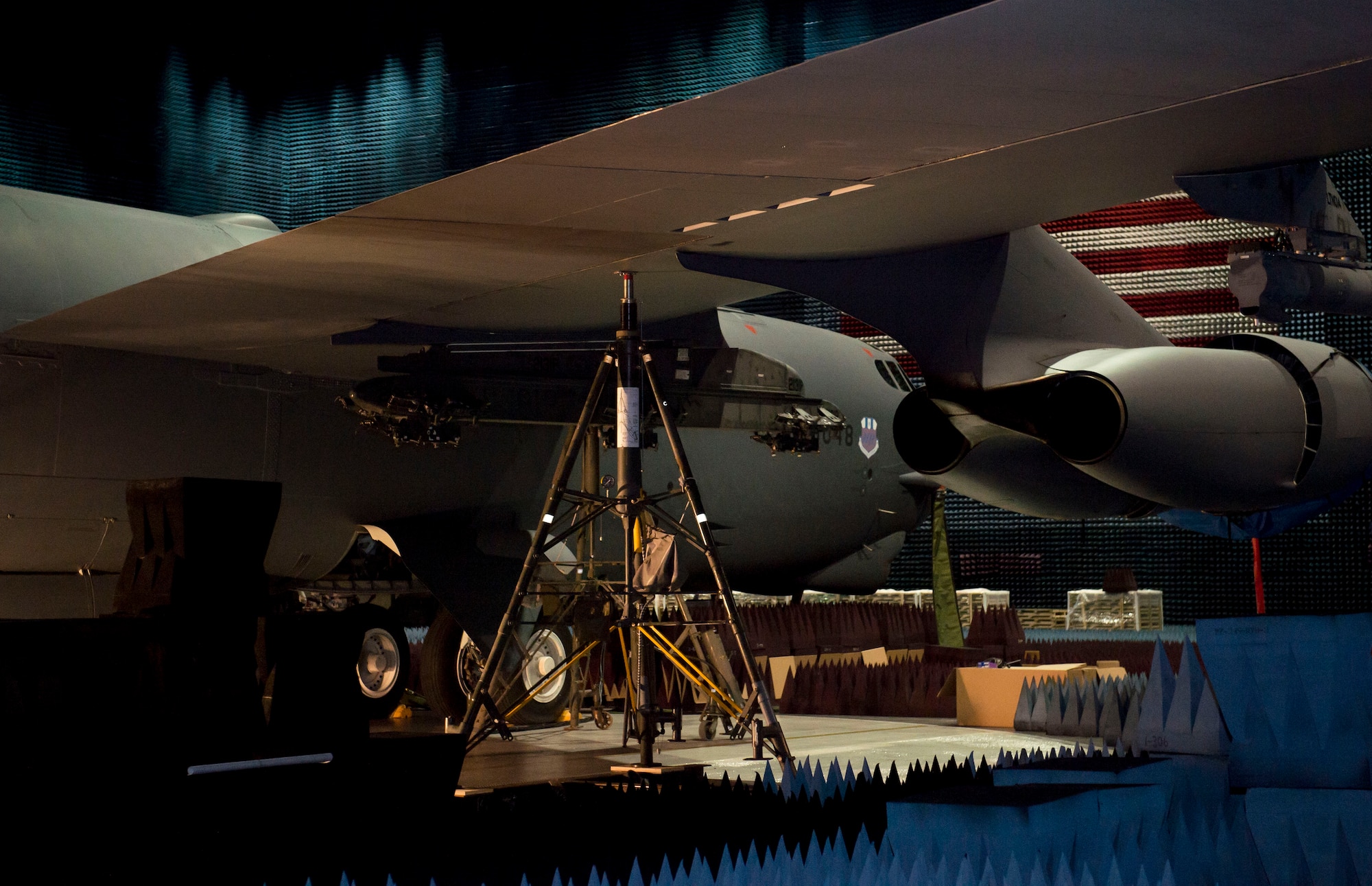 A maintenance team from Minot, Air Force Base, North Dakota, jacked the B-52 Stratofortress up and the landing gear was retracted to simulate in-flight conditions in the Benefield Anechoic Facility. (U.S. Air Force photo by Ethan Wagner)