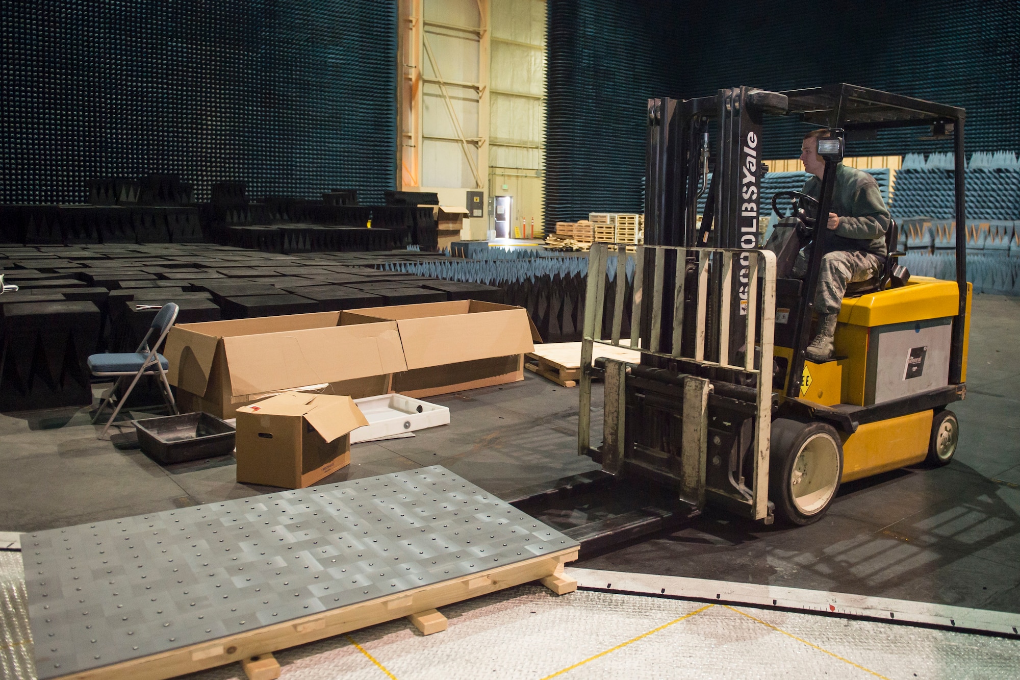 Members of the 772nd TS placed the radiation-absorbing material around the aircraft along with pallets of ferrite tiles to absorb the various emitting frequencies from the B-52. (U.S. Air Force photo by Ethan Wagner)