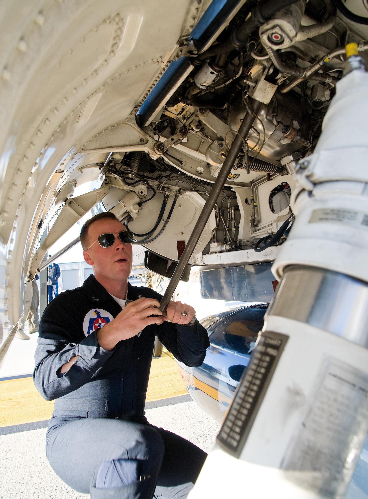 Staff Sgt. Todd Hughes, tactical aircraft maintainer for Thunderbird 8, an F-16 Fighting Falcon, pumps up an accumulator used to start the engine Jan. 25, 2017, at Dover Air Force Base, Del. Hughes’ responsibilities include performing scheduled inspections, functional checks and preventive maintenance on tactical aircraft and aircraft-installed equipment, maintaining and repairing all parts of the aircraft and ensuring that the aircraft are properly serviced with fuel, hydraulic fluid and liquid oxygen. (U.S. Air Force photo by Roland Balik)