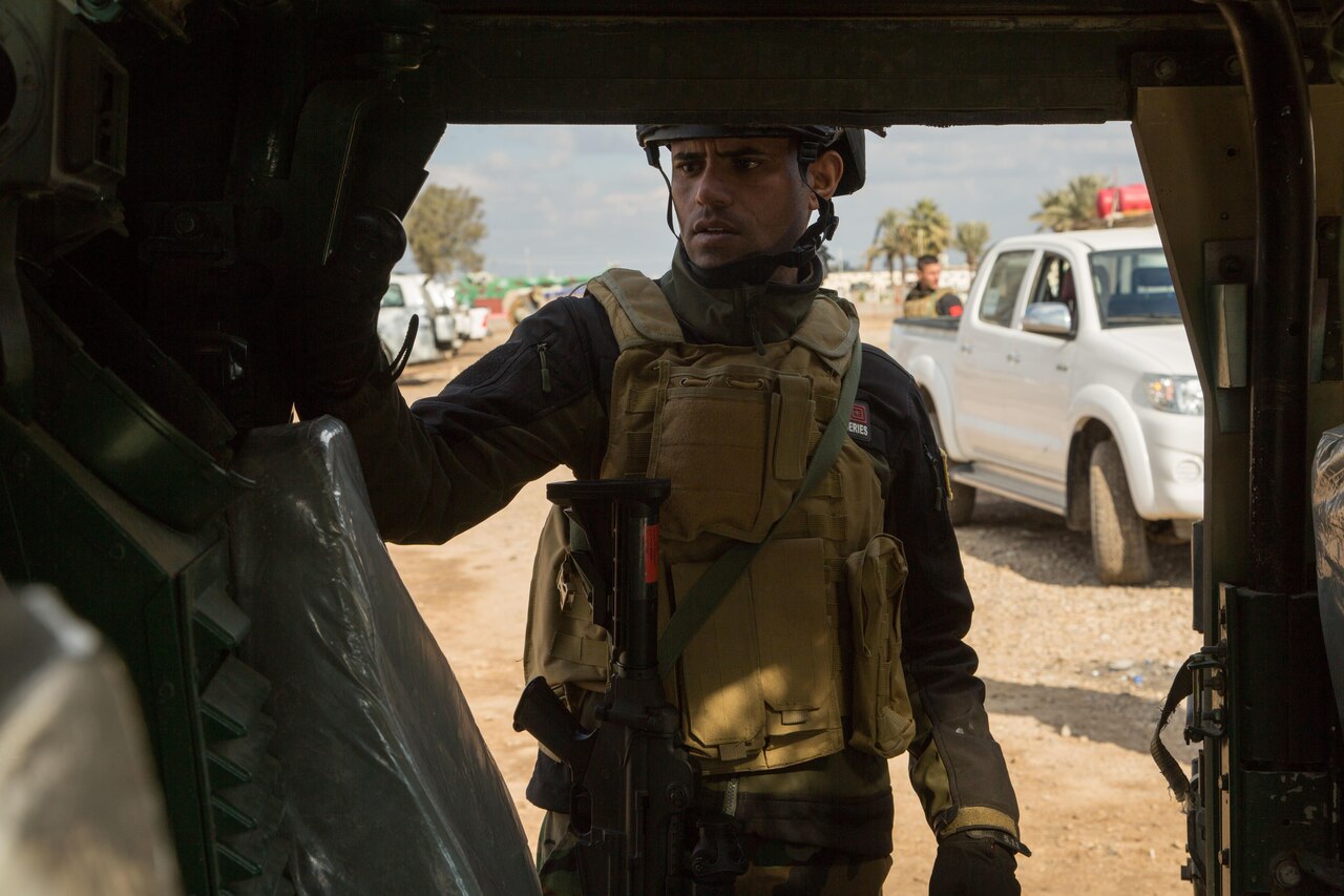 An Iraqi soldier searches a vehicle during training at Camp Taji, Iraq, Jan. 22, 2017. Iraqi soldiers were learning to conduct personnel and vehicle searches for improvised explosive devices in support of Combined Joint Task Force Operation Inherent Resolve. Army photo by Spc. Christopher Brecht