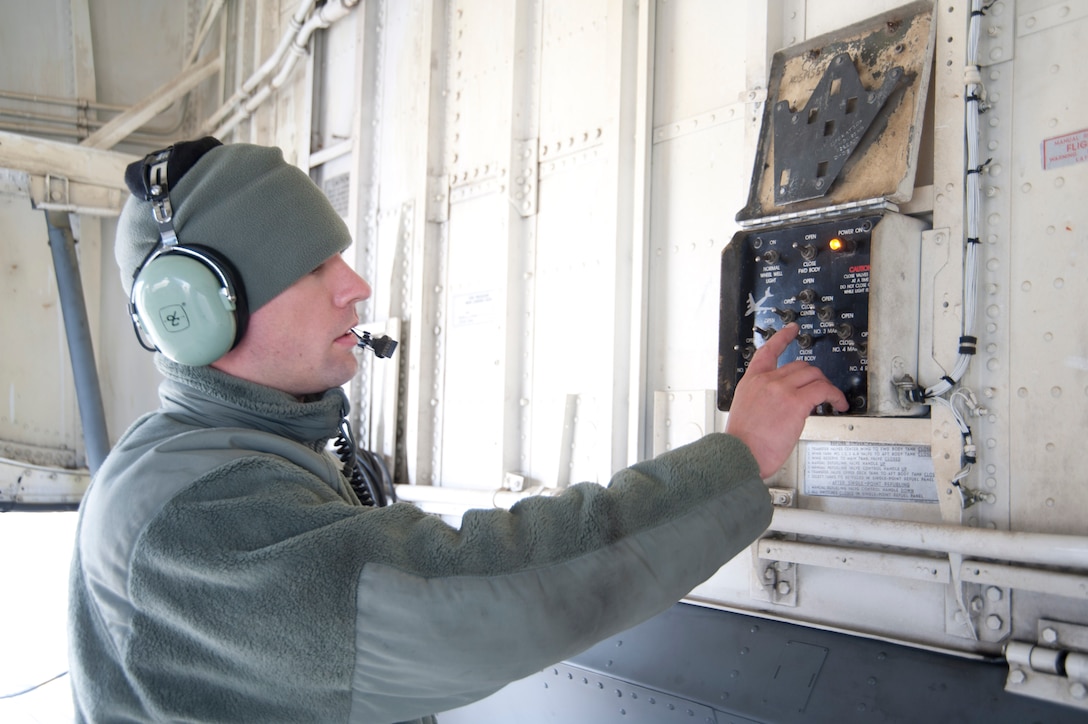 Senior Airman Jaramie York, 459th Aircraft Maintenance Squadron maintainer, operates a single point refuel panel on a KC-135R Stratotanker at Joint Base Andrews, Md., Dec. 13, 2016. As an aircraft structural maintainer, York’s responsibilities range from fabricating replacement aircraft structural components to refueling aircraft to marshaling departing aircraft onto the runway. (U.S. Air Force photo by Staff Sgt. Joe Yanik)