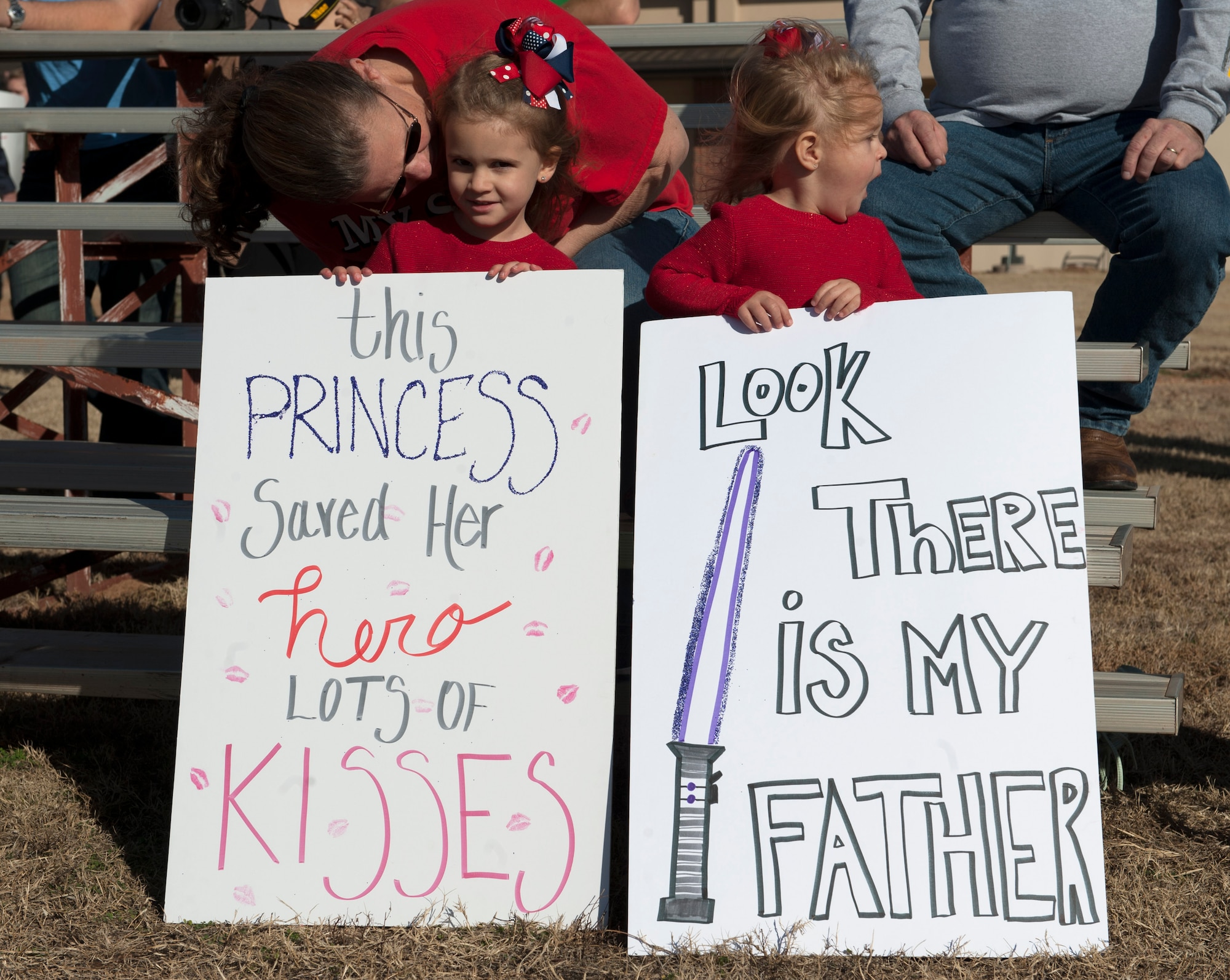 Mallory and McKenzie Curtis await their father’s return at Dyess Air Force Base, Texas, Jan. 20, 2017. U.S. Air Force Staff Sgt. James Curtis returned home after a four-month deployment supporting operations in U.S. AFRICOM and U.S. European Command. 