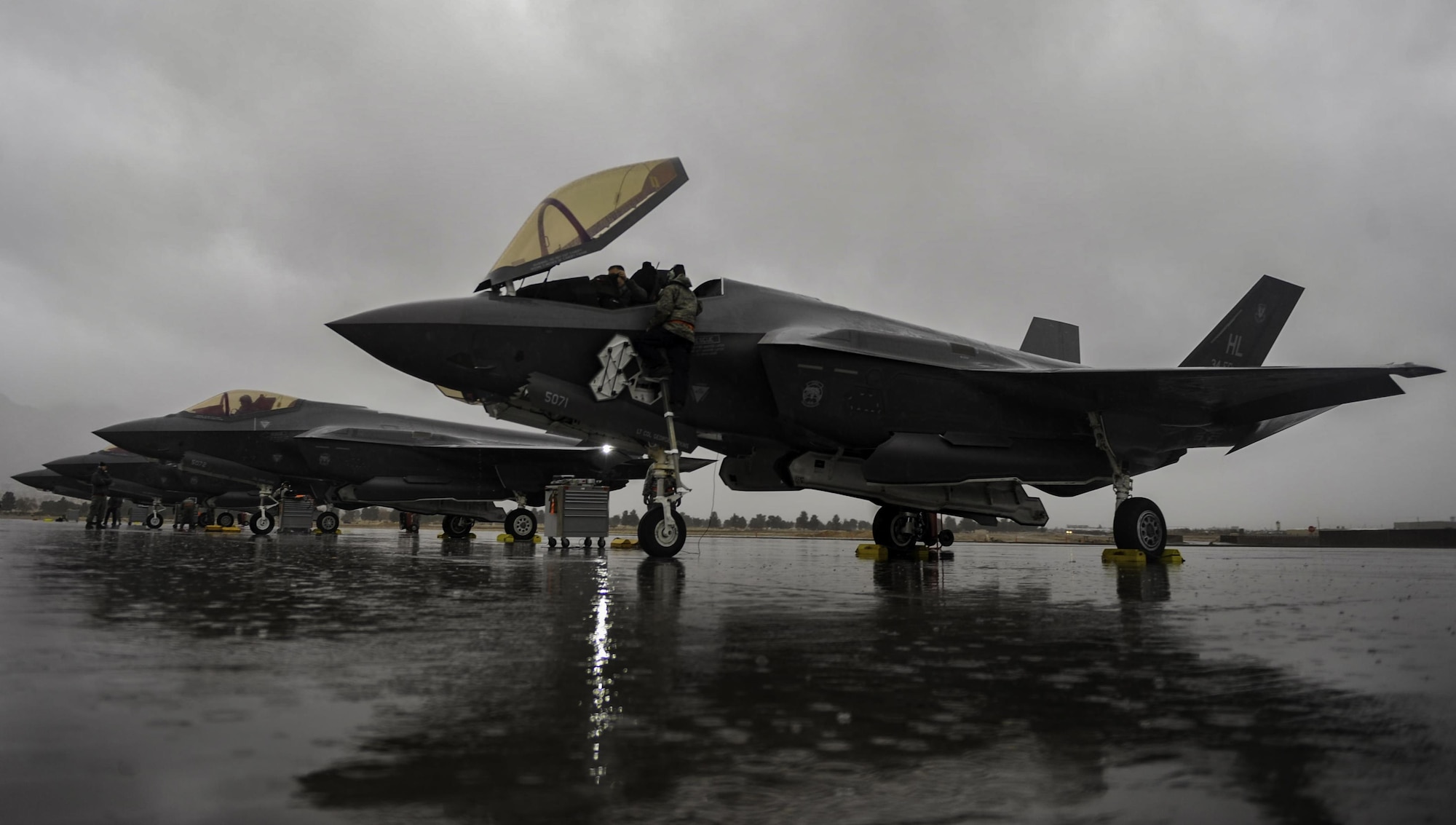 Four F-35A Lightning IIs assigned to the 34th Fighter Squadron, Hill Air Force Base, Utah, rest on the flightline after landing to participate in Red Flag 17-1 at Nellis Air Force Base, Nev., Jan. 21, 2017. Red Flag provides the 34th FS the opportunity to enhance their tactical operational skills alongside military aircraft from coalition forces. (U.S. Air Force photo by Airman 1st Class Kevin Tanenbaum/Released)