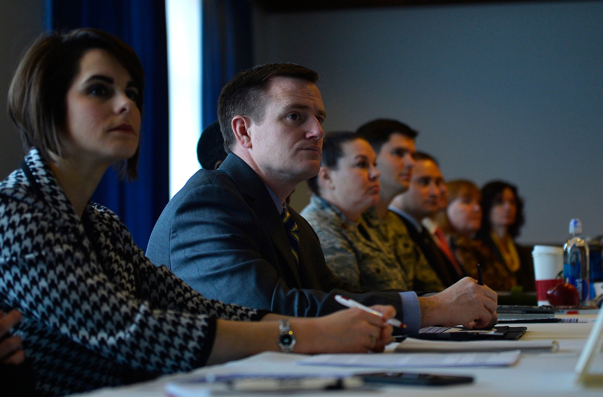 Military and civilian defense contracting representatives attend a meeting at Ramstein Air Base, Germany, Jan. 24, 2017, to discuss ways to procure supplies more efficiently. The meeting emphasized the importance of cooperation between contracting agencies from all branches of the U.S. military. (U.S. Air Force photo by Airman 1st Class Joshua Magbanua).