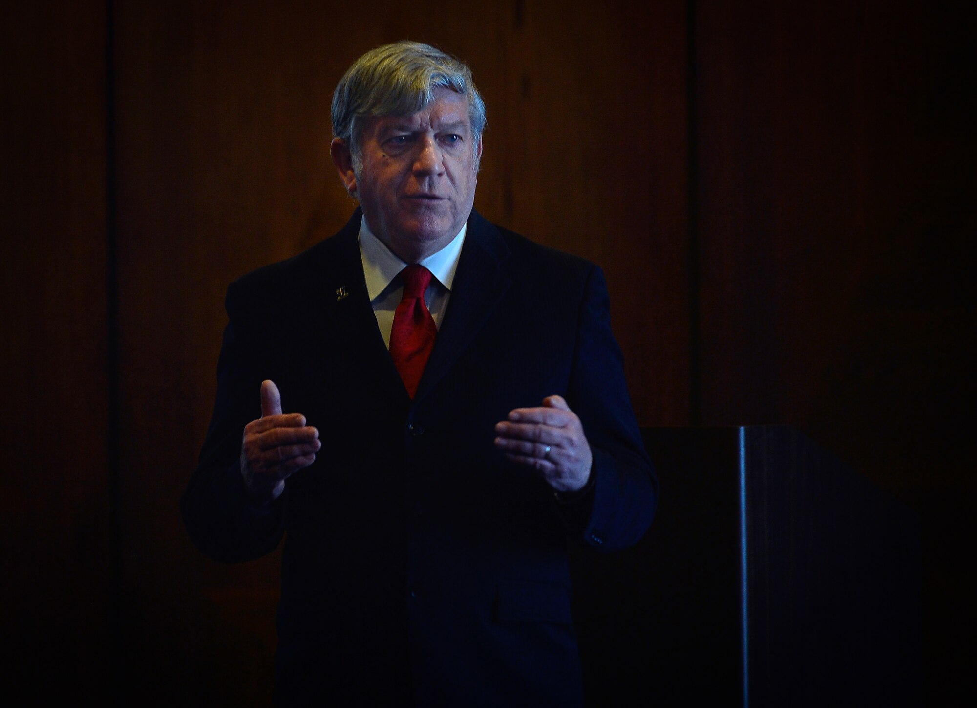 Paul G. Michaels, deputy principal assistant responsible for contracting at the 409th Contracting Support Brigade, speaks during a meeting on Ramstein Air Base, Germany, Jan. 24, 2017. Military and civilian defense contracting representatives from all branches converged on Ramstein to discuss various ways to procure military supplies more efficiently. (U.S. Air Force photo by Airman 1st Class Joshua Magbanua).