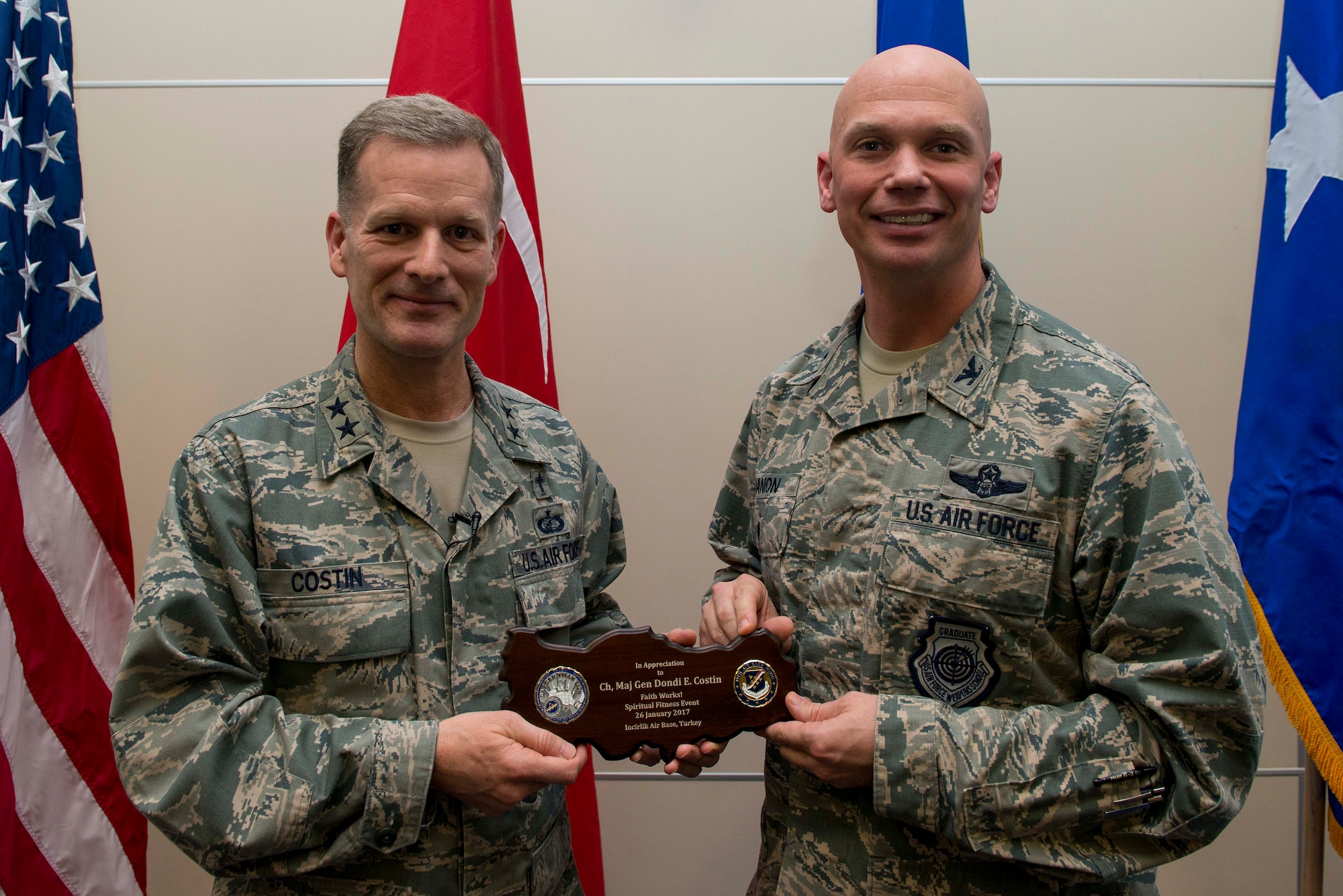 Col. Michael Manion (right), 39th Air Base Wing vice commander, presents a plaque to Chaplain (Maj. Gen.) Dondi Costin, Air Force chief of chaplains, during a spiritual fitness luncheon, Jan. 26, 2017, at Incirlik Air Base, Turkey. As chief of chaplains, Costin creates guidance and offers advice on all matters involving religious and moral welfare for Air Force personnel, as well as establishing programs to meet the religious needs of Airmen and their dependents. (U.S. Air Force photo by Senior Airman John Nieves Camacho)