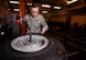 U.S. Air Force Senior Airman Tyler Hyatt, 100th Maintenance Squadron aero repair journeyman, collects and inspects bolts, nuts and washers from a wheel and tire assembly Jan. 20, 2017, on RAF Mildenhall, England. There are more than 50 nuts, bolts and washers joining the assembly together. (U.S. Air Force photo by Senior Airman Christine Halan)
