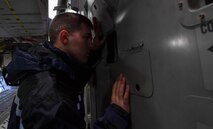 Staff Sgt. Zachary Rodewig, 721st Aircraft Maintenance Squadron C-5 Galaxy crew chief, inspects a C-17 Globemaster III before it can be cleared for departure at Ramstein Air Base, Germany, Jan. 24, 2017. All Airmen within the 721st AMXS must be qualified on C-17 Globemaster III and C-5 aircraft as they are responsible for inspecting, repairing, and servicing all C-17 and C-5 aircraft that come through Ramstein. (U.S. Air Force photo by Senior Airman Tryphena Mayhugh)