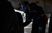 Staff Sgt. Zachary Rodewig, 721st Aircraft Maintenance Squadron C-5 Galaxy crew chief, removes the cap on a tire of a C-5 at Ramstein Air Base, Germany, Jan. 4, 2017. Rodewig checked the tire pressure of all 28 tires on the plane. The 721st AMXS inspects, repairs, and services all C-17 and C-5 Galaxy aircraft that come through Ramstein. (U.S. Air Force photo by Senior Airman Tryphena Mayhugh)