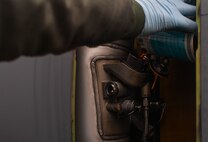 Senior Airman Earl Shelton, 721st Aircraft Maintenance Squadron aerospace maintenance technician, pours oil into a C-5M Super Galaxy at Ramstein Air Base, Germany, Jan. 24, 2017. Shelton and other 721st AMXS Airmen also checked the tire pressure and refueled the plane. In one weekend, the 721st AMXS are responsible for more missions than all the other squadrons in the European and Pacific Commands handle in a month combined. (U.S. Air Force photo by Senior Airman Tryphena Mayhugh)