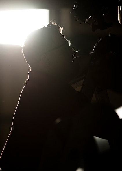 Airman 1st Class Joseph Langmann, 23rd Aircraft Maintenance Unit weapons load crew member, prepares a bomb rack for an inert GBU-31 at Minot Air Force Base, N.D., Jan. 20, 2017. The 23rd and 69th AMU competed in a timed bomb load as a part of the Load Crew of the Quarter competition. (U.S. Air Force photo/Airman 1st Class J.T. Armstrong)