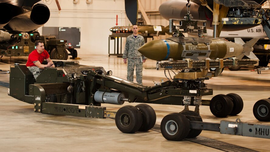 Airman 1st Class Joseph Langmann, 23rd Aircraft Maintenance Unit weapons load crew member, operates a jammer during the Load Crew of the Quarter competition at Minot Air Force Base, N.D., Jan. 20, 2017. The competition was comprised of four parts: dress and appearance, a loader’s knowledge test, toolbox inspection and the timed bomb load. (U.S. Air Force photo/Airman 1st Class J.T. Armstrong)