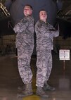Staff Sgt. Eric Hathaway, 69th Aircraft Maintenance Unit weapons load crew chief, and Tech. Sgt. Fred Manternach, 23rd AMU weapons load crew chief, participate in the 5th Bomb Wing Load Crew of the Quarter competition in Dock 7 at Minot Air Force Base, N.D., Jan. 20, 2017. Two weapons load crews representing the 23rd AMU and the 69th AMU were timed on their ability to load two inert munitions onto a B-52H Stratofortress. (U.S. Air Force photo/Airman 1st Class Alyssa M. Akers)