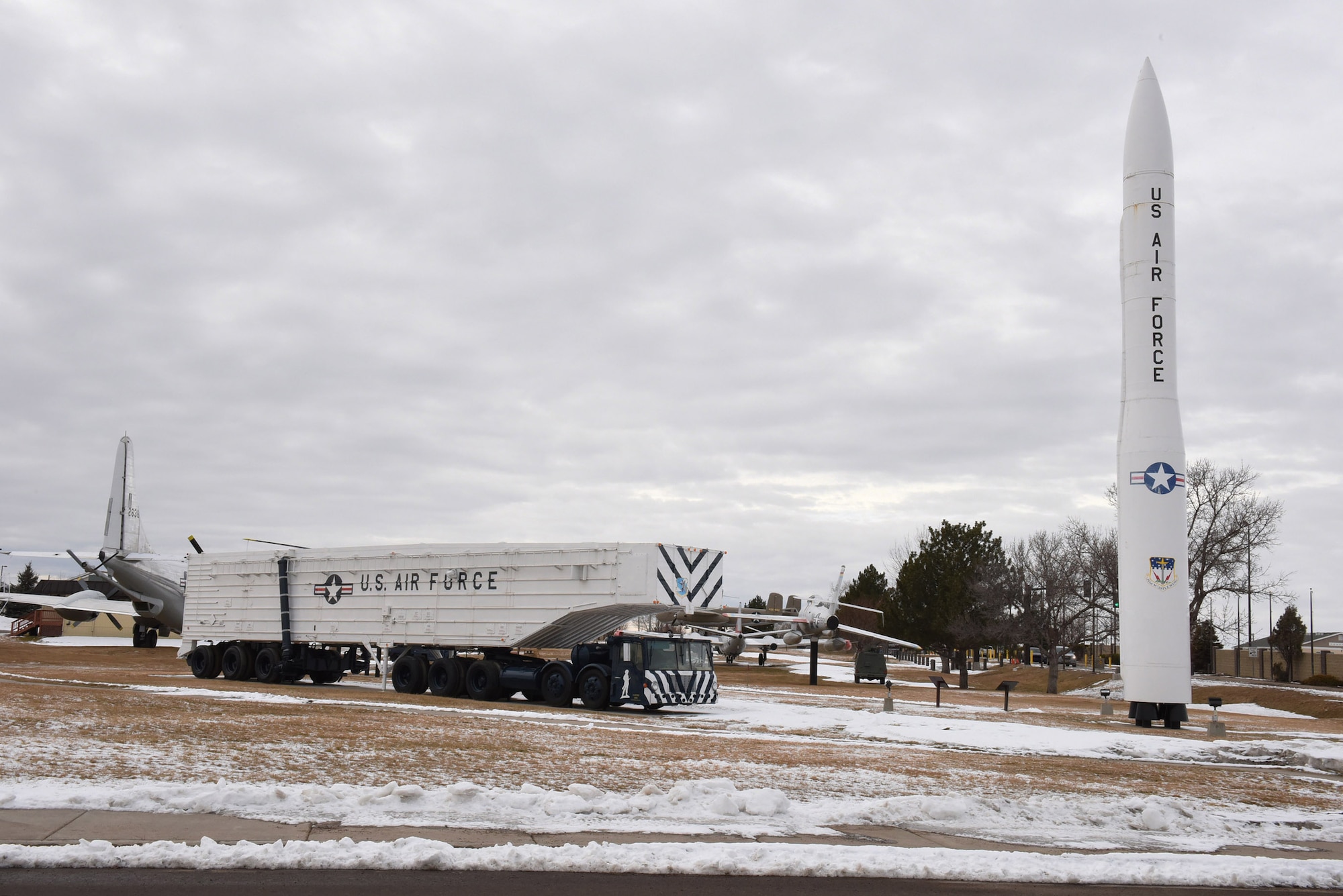 A static display of a Minuteman III intercontinental ballistic missile along with a vintage Minuteman transporter erector truck, is one of many exhibits on display at the Malmstrom Historic and Air Park at Malmstrom Air Force Base, Mont.  The museum  contains more than 400 items on display that depict the history of Malmstrom and the Minuteman missile program.  (Air Force photo/Jason Heavner)