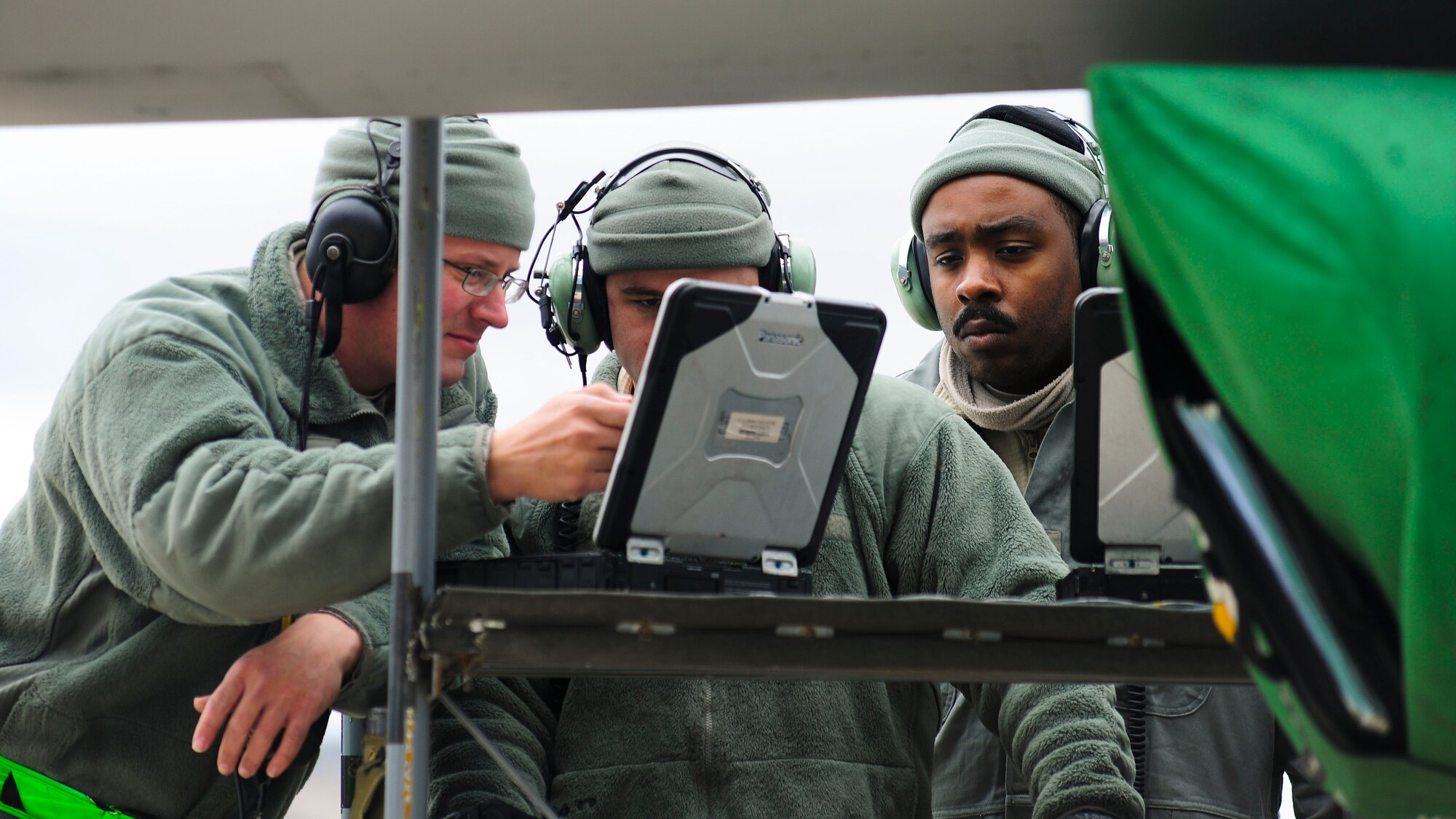 Three 31st Aircraft Maintenance Squadron Airmen run pre-flight checks on an F-16 Fighting Falcon from the 555th Fighter Squadron, Aviano Air Base, Italy during a flying training deployment at Souda Bay, Greece on Jan. 23, 2016. Fourteen Aviano F-16s, one KC-135 Stratotanker from the Arizona Air National Guard’s 161st Air Refueling Wing and 280 Airmen deployed to Souda Bay to train with Greece’s Hellenic air force for the two week FTD, scheduled from Jan. 20 to Feb. 3. The FTD was hosted to evaluate aircraft and personnel capabilities and increase interoperability between the two NATO allies. (U.S. Air Force photo by Staff Sgt. Austin Harvill)