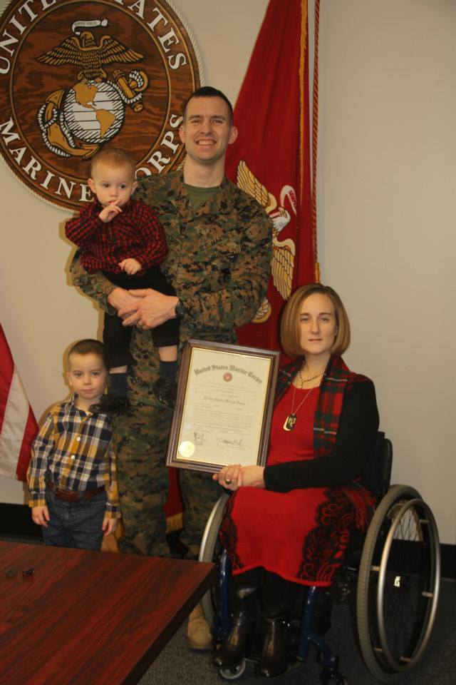 Staff Sgt. James McGregor poses with his family after being promoted to his current rank at Recruiting Station Twin Cities in Fort Snelling, Minnesota, Jan. 1, 2015. He was pinned on by his wife, Melissa McGregor, and son, Ayden McGregor. James McGregor currently serves as the Regional Network Operations and Security Center Watch Chief for Marine Corps Forces Reserve.