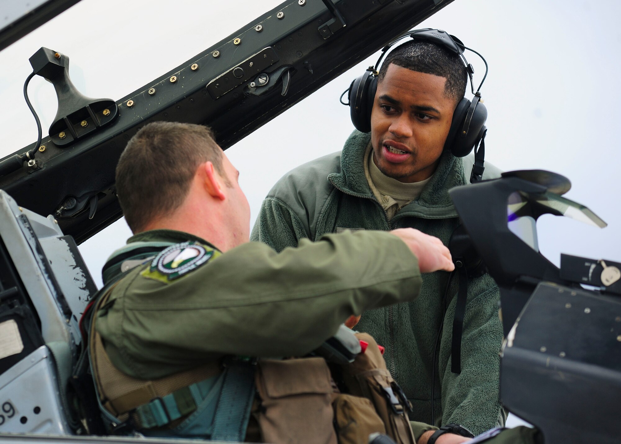 Capt. Kirk Devine, 555th Fighter Squadron F-16 Fighting Falcon pilot, and Senior Airman Daniel Baston, 31st Aircraft Maintenance Squadron crew chief, both from Aviano Air Base, Italy finish pre-flight checks during a flying training deployment at Souda Bay, Greece on Jan. 23, 2016. Fourteen Aviano F-16s, one KC-135 Stratotanker from the Arizona Air National Guard’s 161st Air Refueling Wing and 280 Airmen deployed to Souda Bay to train with Greece’s Hellenic air force for the two week FTD, scheduled from Jan. 20 to Feb. 3. (U.S. Air Force photo by Staff Sgt. Austin Harvill)