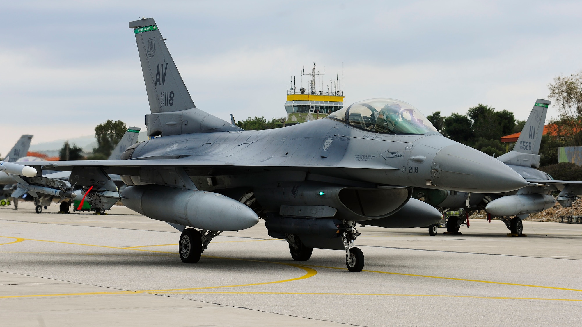 Capt. Kirk Devine, 555th Fighter Squadron F-16 Fighting Falcon pilot from Aviano Air Base, Italy taxis toward the runway during a flying training deployment at Souda Bay, Greece on Jan. 23, 2016. Fourteen Aviano F-16s, one KC-135 Stratotanker from the Arizona Air National Guard’s 161st Air Refueling Wing and 280 Airmen deployed to Souda Bay to train with Greece’s Hellenic air force for the two week FTD, scheduled from Jan. 20 to Feb. 3. The FTD was hosted to evaluate aircraft and personnel capabilities and increase interoperability between the two NATO allies. (U.S. Air Force photo by Staff Sgt. Austin Harvill)