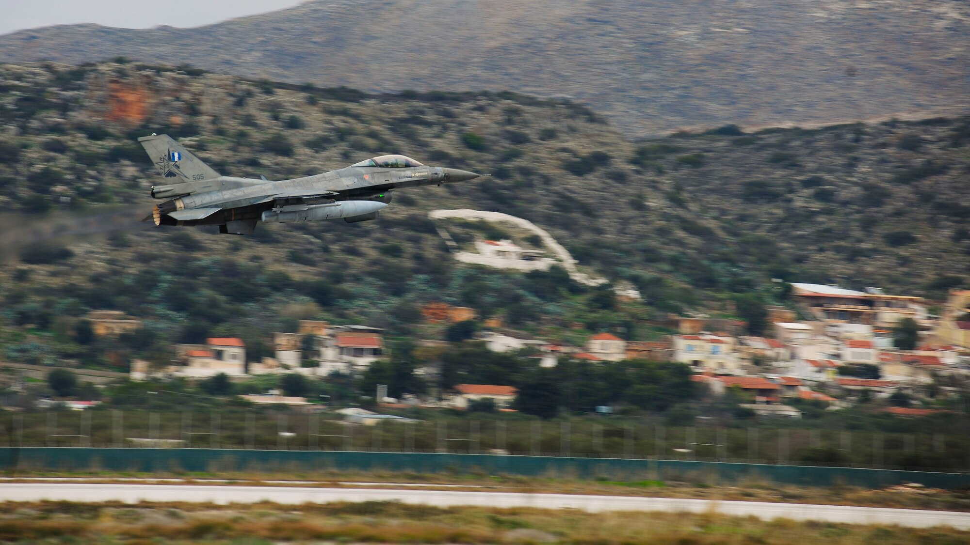 An F-16 Fighting Falcon from the Hellenic air force takes off at Souda Bay, Greece on Jan. 23, 2016. The Hellenic air force is training with the 555th Fighter Squadron from Aviano Air Base, Italy and the Arizona Air National Guard's 161st Air Refueling Wing during a flying training deployment to evaluate aircraft and personnel capabilities and improve interoperability between the two NATO allies. (U.S. Air Force photo by Staff Sgt. Austin Harvill)