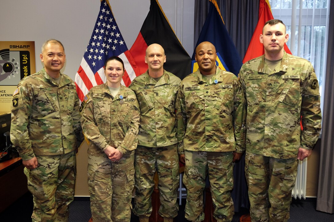 KAISERSLAUTERN, Germany — Left to right, Col. Alex Wells, deputy commanding officer, 7th Mission Support Command, Sgt. Erin Hodge, office of the surgeon; Command Sgt. Maj. Raymond Brown, senior enlisted leader; Spc. Baholo Maphiri, Headquarters and Headquarters Company, 457th Civil Affairs Battalion and Sgt. Peter Bickelhaupt, HHC, 361st Civil Affairs Brigade, pose for a picture Jan. 24, 2017 after the Best Warrior Competition award ceremony. Maphiri won the enlisted BWC category, while Hodge won the noncommissioned officer BWC in a close contest with Bickelhaupt. The two winners are now scheduled to compete in the 21st TSC and U.S. Army Reserve Command's BWCs as the 7th MSC representatives.