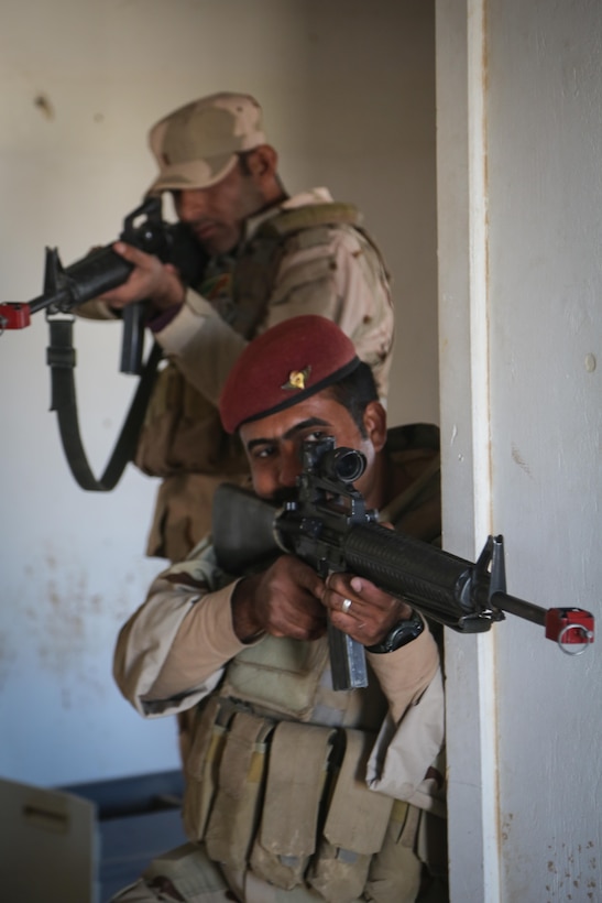 Iraqi soldiers from 7th Iraqi Army Division provide security during the platoon assault movement portion of their culminating training at Al Asad Air Base, Iraq, Jan. 15, 2017. Training at building partner capacity sites is an integral part of Combined Joint Task Force – Operation Inherent Resolve’s effort to train Iraqi security forces personnel. CJTF-OIR is the global Coalition to defeat ISIL in Iraq and Syria. (U.S. Army photo by Sgt. Lisa Soy)