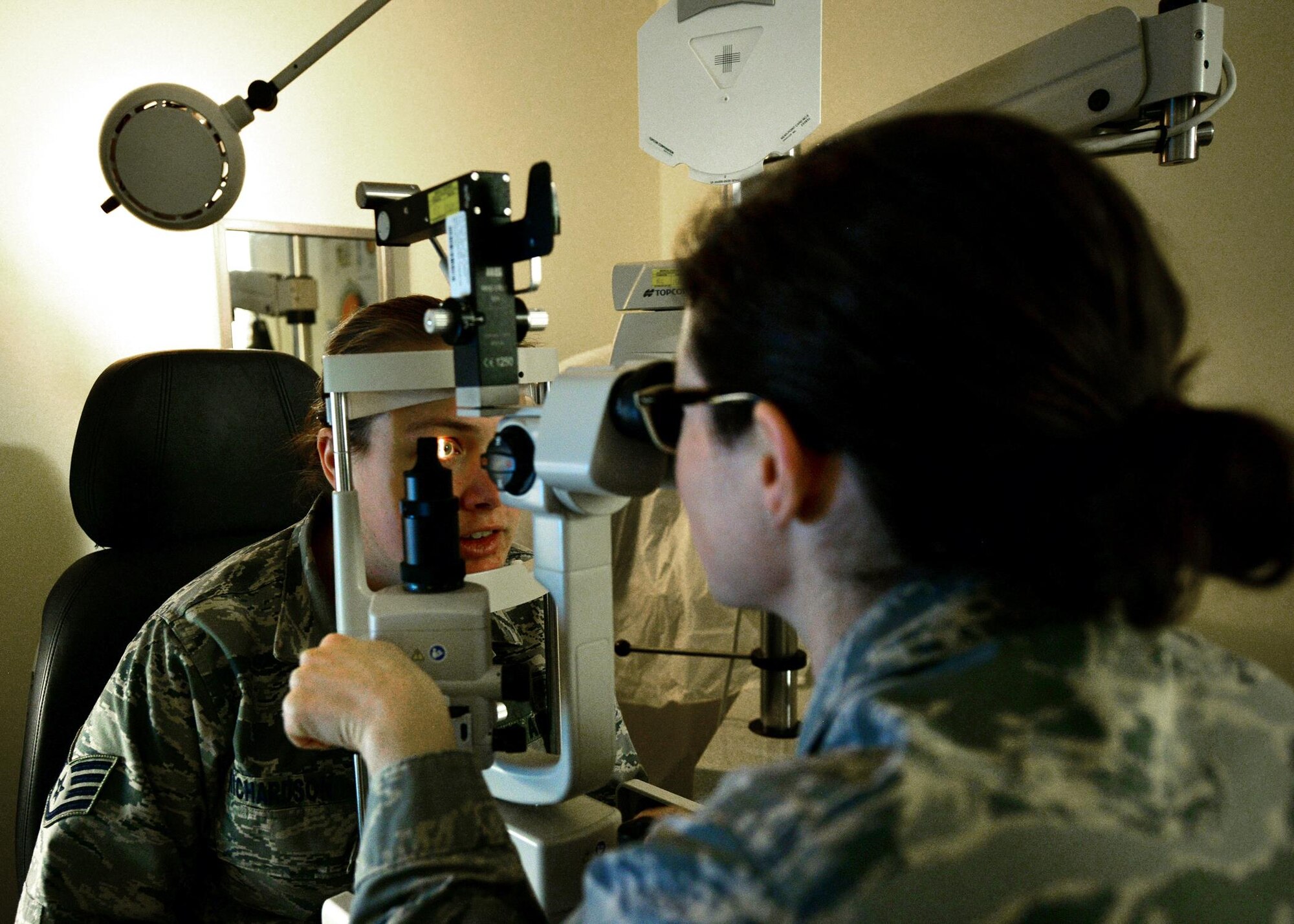 U.S. Air Force Staff Sgt. Amanda Richardson gets her eyes examine by U. S. Air Force Major Casey Shoop, both with the 55th Medical Group, inside the Ehrling Bergquist Clinic on Offutt AFB, Neb., Jan. 26. Members of the Air Force’s Biomedical Sciences Corps were recognized during an appreciation week held January 23-27. 