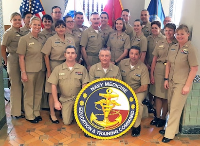 Officers and chief petty officers from Navy Reserve-Navy Medicine Education and Training Command pose for a photo at Navy Medicine Education, Training and Logistics Command at Joint Base San Antonio-Fort Sam Houston Jan. 20 during a three-day leadership symposium. 