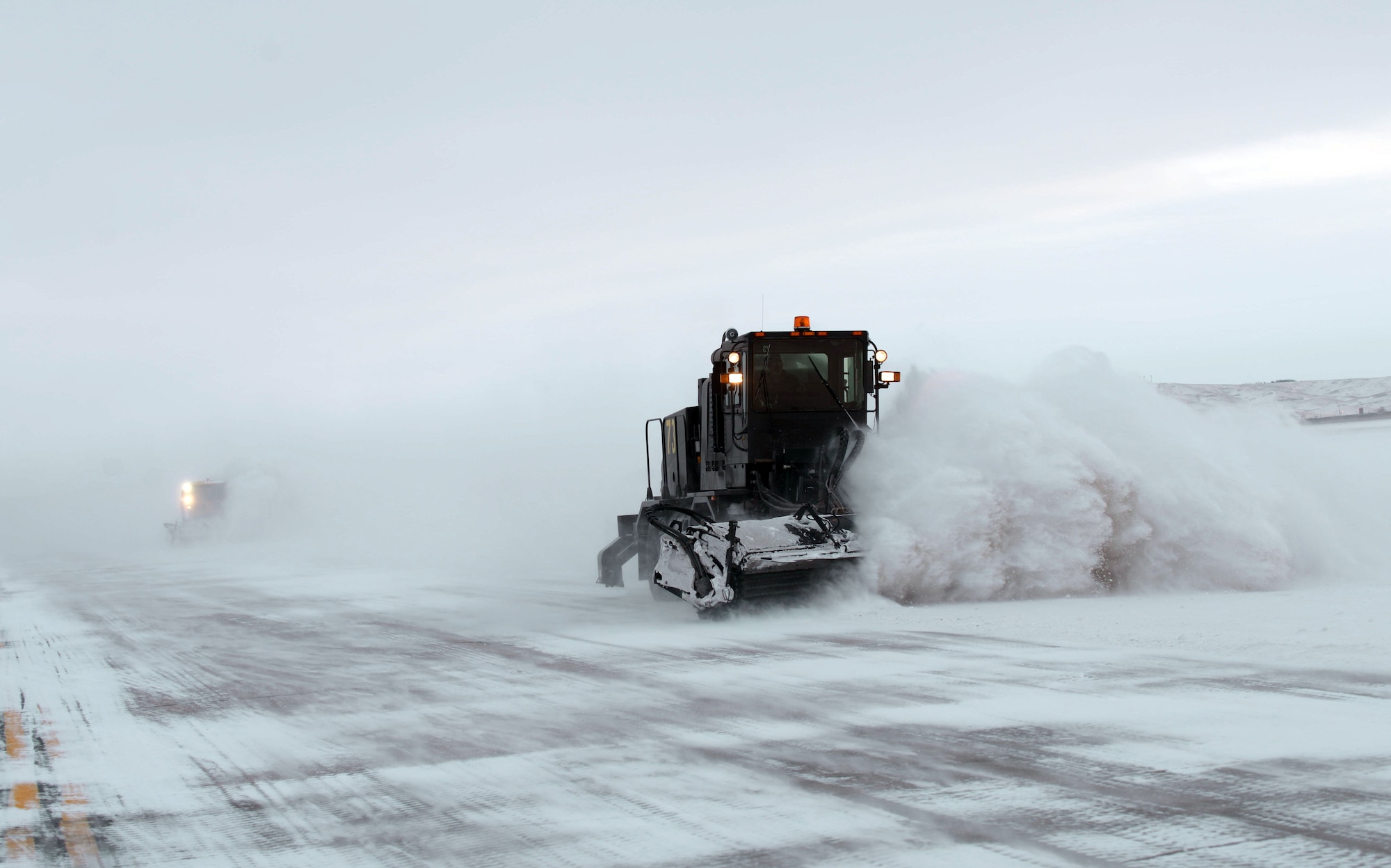 Personnel from the 28th Civil Engineer Squadron remove snow from the flight line at Ellsworth Air Force Base, S.D., on Jan. 25, 2017. With more than three million square yards of flight line, the civil engineers, also known as “Dirt Boyz”, have cleared over 20 inches of snow this season alone. (U.S. Air Force photo by Airman 1st Class Donald C. Knechtel)