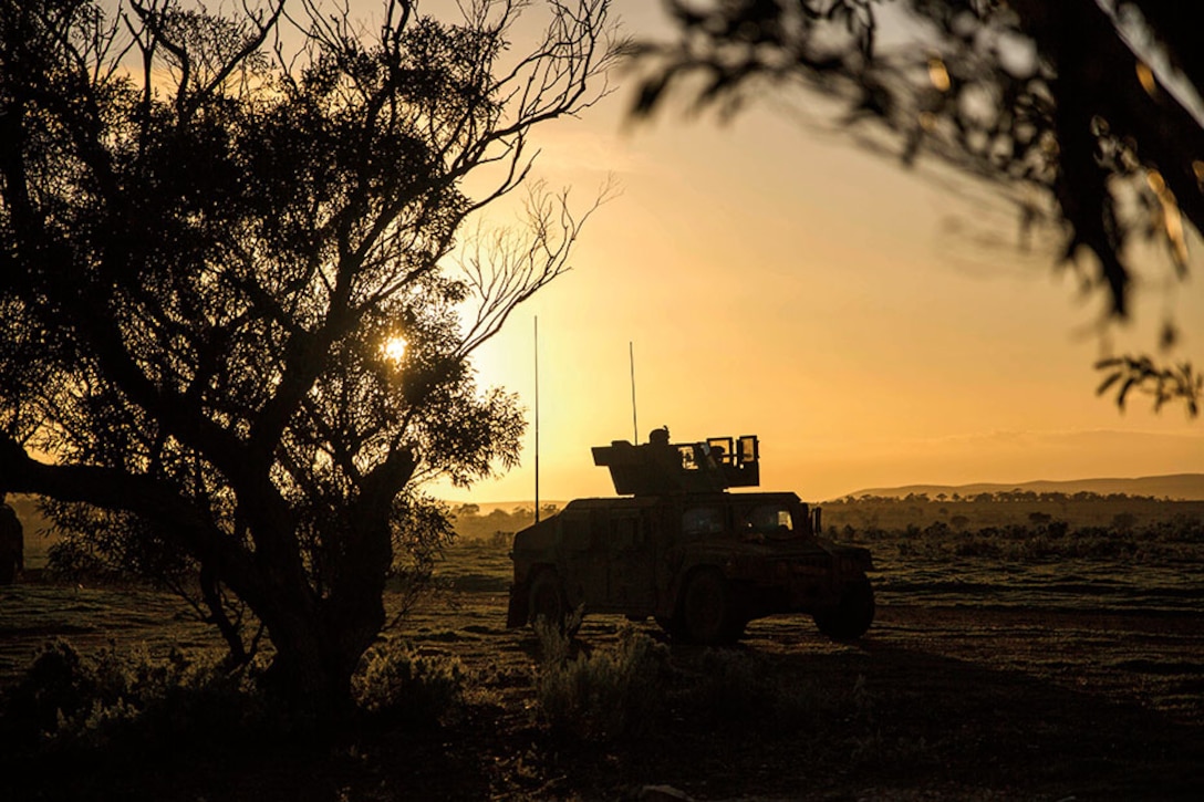 U.S. Marines move toward objective during Exercise Hamel at Cultana Training Area, South Australia, Australia, July 2016.