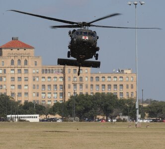 Soldiers from Company C, 2nd Battalion, 227th Aviation Regiment, 1st Air Cavalry Brigade, 1st Cavalry Division arrived in five helicopters – four Hueys and a Chinook – from Fort Hood, Texas, Jan. 19 and landed on the MacArthur Parade Field at Joint Base San Antonio-Fort Sam Houston and proceeded to the U.S. Army Medical Department Museum for a tour.