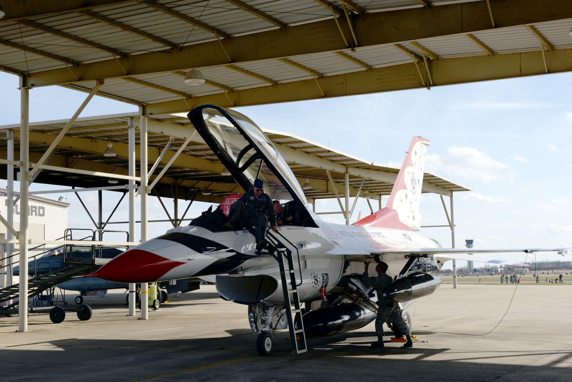 Capt. Erik Gonsalves, U.S. Air Force Thunderbird pilot, arrives on Dannelly Field at the Montgomery Regional Airport in an F-16D Thunderbird, Jan. 25, 2017. Before landing, Gonsalves conducted a flight survey of Maxwell Air Force Base and the surrounding area for the upcoming Air Show in April. (U.S. Air Force photo/Senior Airman Tammie Ramsouer)