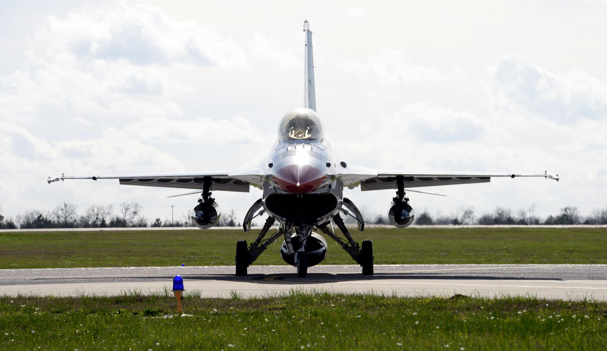 An F-16D Thunderbird jet arrives on Dannelly Field at the Montgomery Regional Airport, Jan. 25, 2017. As Capt. Erik Gonsalves, U.S. Air Force Thunderbird pilot, arrived, he conducted a flight survey of Maxwell Air Force Base and the surrounding area for the upcoming Air Show in April. (U.S. Air Force photo/Senior Airman Tammie Ramsouer)