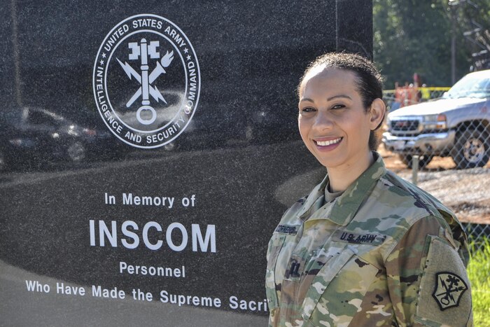 Army photo by Ron Young stands beside the memorial outside U.S. Army Intelligence and Security Command headquarters at Fort Belvoir, Va., Aug. 26, 2016. Army photo by Ron Young