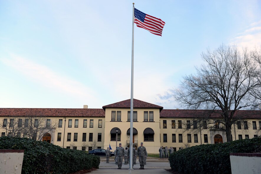 Students from the Airman Leadership School wait for retreat to play on Maxwell Air Force Base, Ala., Jan. 26 2017. All ALS students participate in reveille and retreat every day as part of their duties during the five-week leadership course. (U.S. Air Force photo/Senior Airman Tammie Ramsouer)