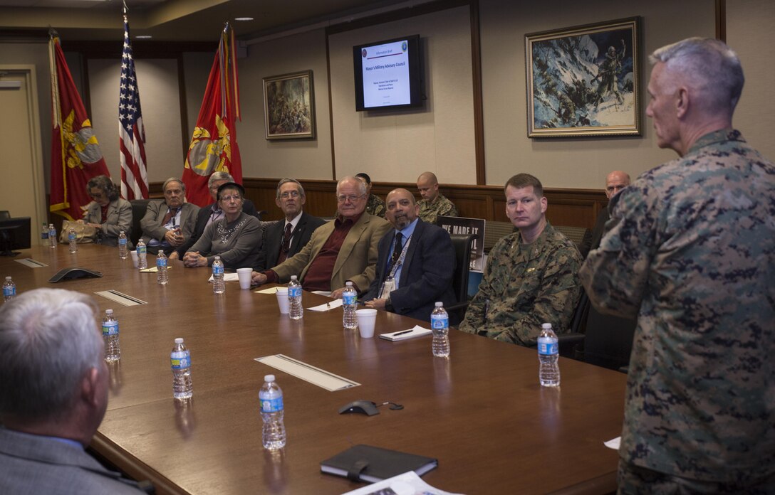 Members of the New Orleans Mayor’s Military Advisory Council and Marines with Marine Forces Reserve listen to Lt. Gen. Rex C. McMillian (right), commander of MARFORRES and Marine Forces North, during an information brief at Marine Corps Support Facility New Orleans, Jan. 27, 2017. During the brief, the council members learned about MARFORRES and MARFORNORTH and the relationship Reserve Marines have with New Orleans and communities around the country. (U.S. Marine Corps photo by Sgt. Ian Leones)