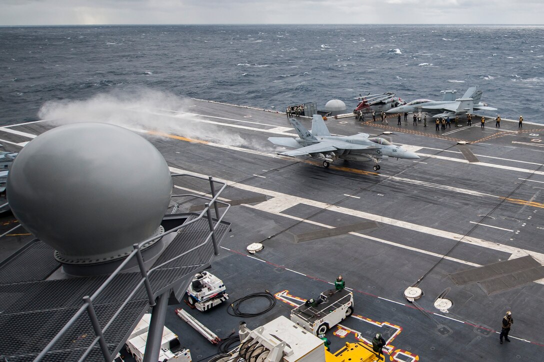 170124-N-YL257-049 ATLANTIC OCEAN (Jan. 24, 2017) An F/A-18E Super Hornet attached to Strike Fighter Squadron (VFA) 31 lands on the flight deck of the aircraft carrier USS George H.W. Bush (CVN 77). The ship is deployed with its carrier strike group in support of maritime security operations and theater security cooperation efforts in the U.S. 5th and 6th Fleet areas of operation. (U.S. Navy photo by Mass Communication Specialist 3rd Class Christopher Gaines/Released) 
