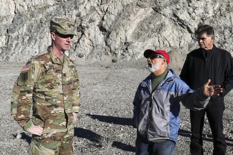 Louis Munoz (center), U.S. Army Corps of Engineers Los Angeles District's dam tender supervisor, discusses Alamo Dam operation with Col. Kirk Gibbs, District commander Jan. 25. The dam provides flood risk reduction, water supply and conservation, recreation, and fish and wildlife enhancement on the Bill Williams River.
